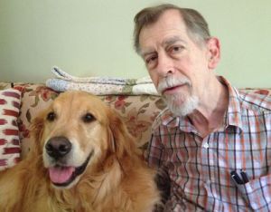 Eric McLuhan on Settee with Pet Dog Finnegan